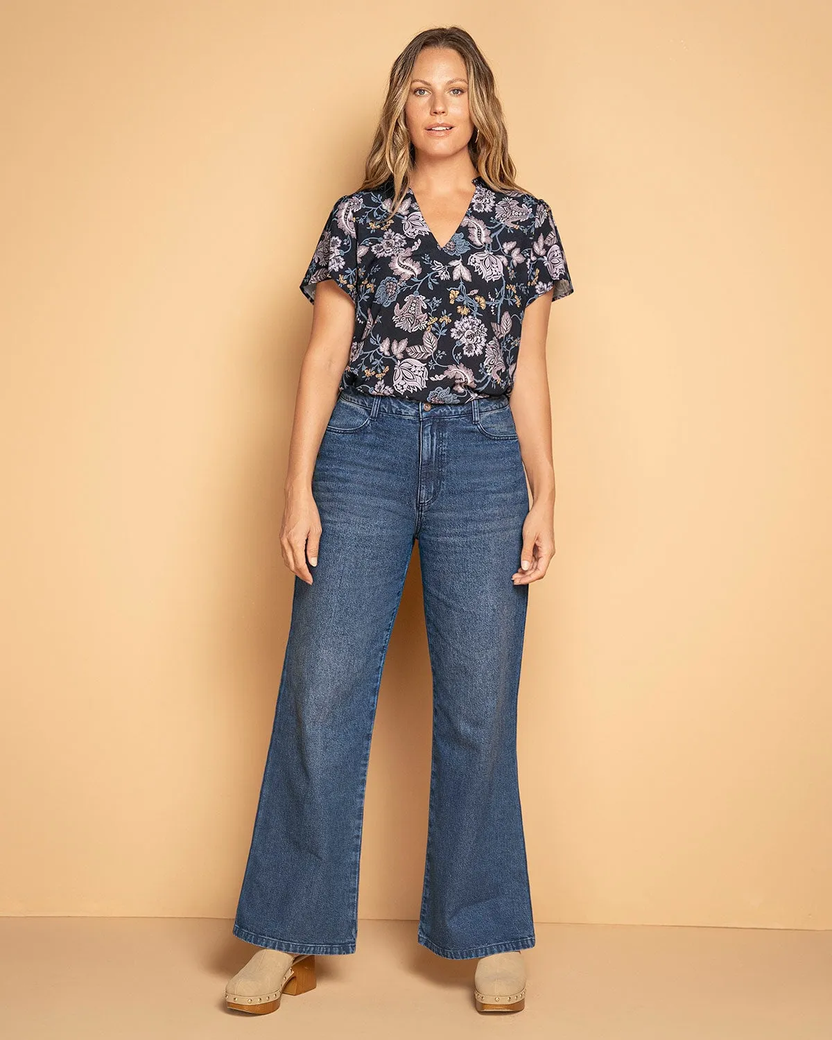 Blusa manga corta cuello nerú con recogido