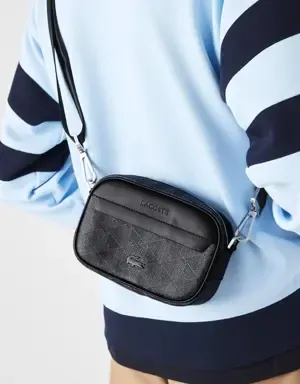 Lacoste Bandolera pequeña de hombre The Blend en lona con monograma