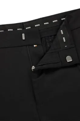 Pantalones slim fit en sarga de lana virgen