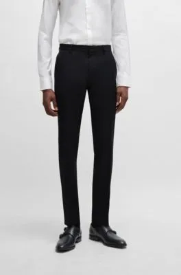 Pantalones slim fit en sarga de lana virgen